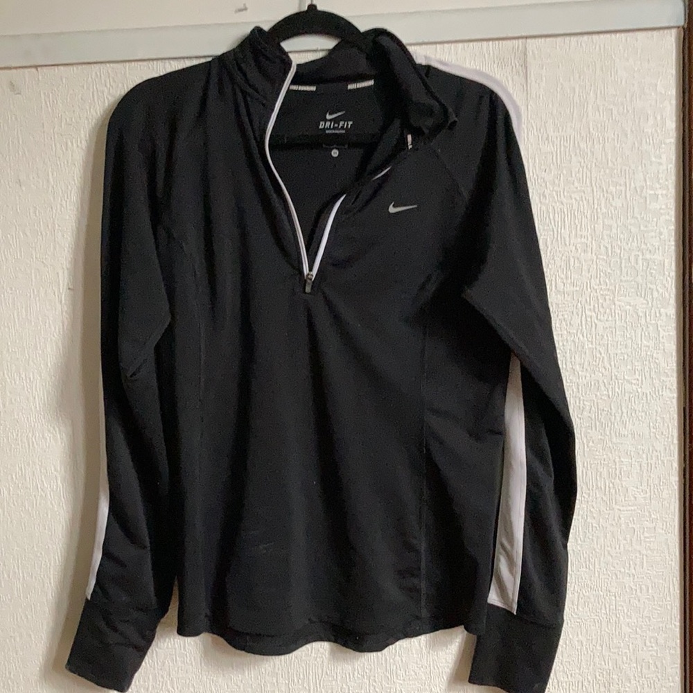 Black and white Nike Pro running quarter zip. Size medium.